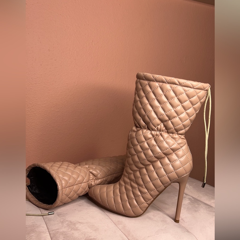 Beige quilted inspired booties.